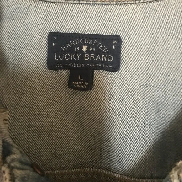 Distressed jean jacket, lots of rips and vintage looking. Comfy too - Picture 7 of 7